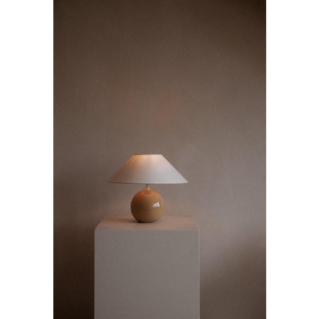 Small Ceramic Table Lamp, in Very Good conditions. Designed from 2000 European Plug (up to 250V).The wiring of this item...