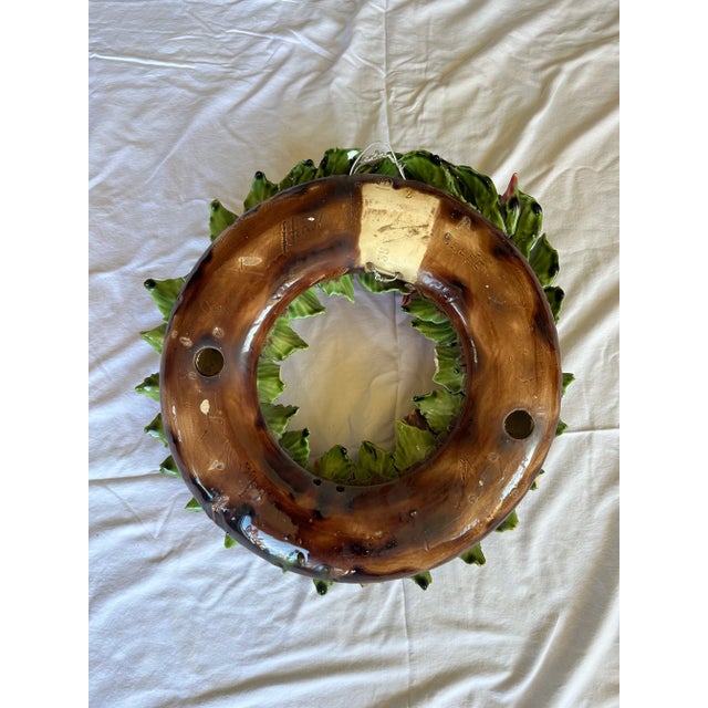 19th Century French Majolica floral wreath by A Selée. Beautiful original vibrant glaze accents the roses + pansies with...