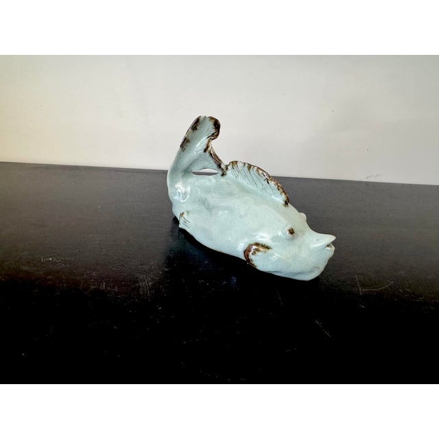 KIM KI-CHUL 김기철 (B.1935) South Korea A celadon Porcelain Water Dropper in the shape of a fish. Republic period...