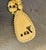 1920s-30s carved ivory or bone necklace w/ elephant pendant and screw clasp. Some yellowing to color throughout as shown....