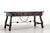 A striking Spanish-style trestle desk (puente) in dark-stained elm, dating from the 20th mid-century and closely inspired...