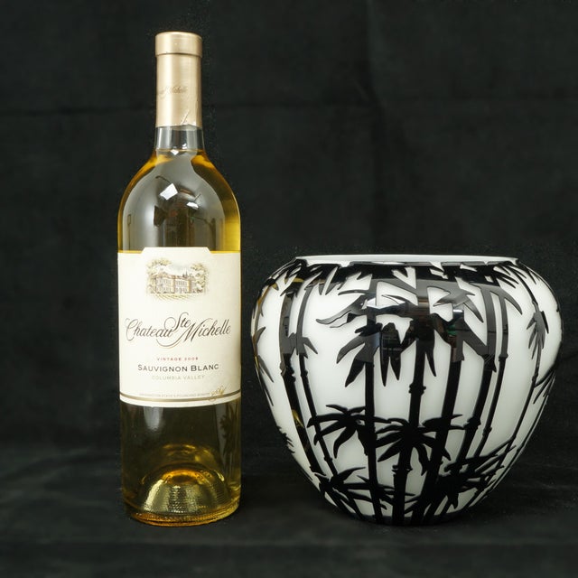 A striking contemporary Mid-century Modern revival cameo glass vase that features an intricately acid-etched and sculpted...
