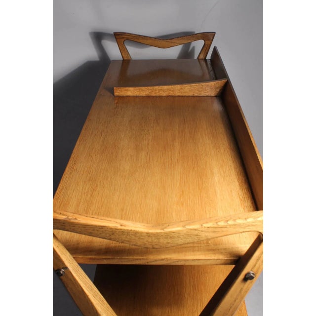 A rare rolling bar cart console server by Harold Schwartz for Romweber. A beautiful work of art. One of his best designs...