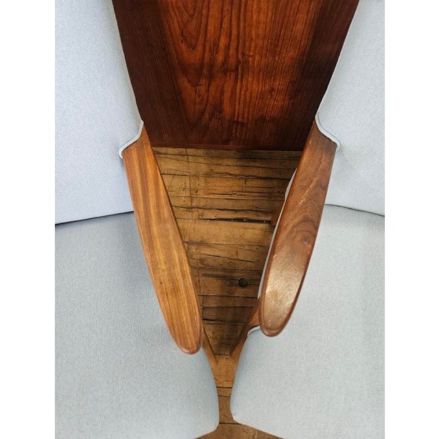 Pair of Danish Vintage Lounge Chairs, 1960s. Each chair features its original, beautifully sculpted teak frame, showcased...
