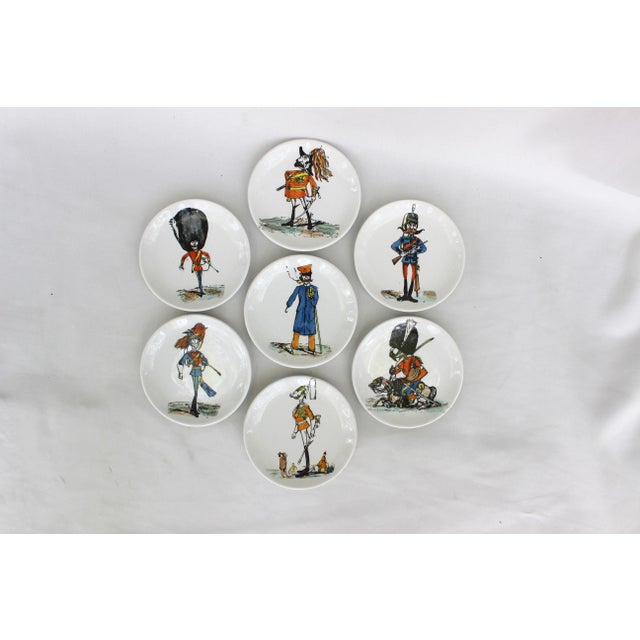 Set of Seven Soldier Caricature Porcelain Coasters attributed to Piero Fornasetti signed by Bucciarelli