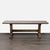 Oak trestle table resting on two pedestals. Brand: Cushman Classics by General Interiors. Dimensions (in): 84W x 24D x 30H.