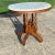 East Lake Victorian Marble topped parlor table. Intricate carved base, four legs holding four posts. Excellent coloring...