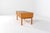 Danish mid-century low cabinet in oak veneer, dating from the 1960s. This elegant and minimal piece features two spacious...