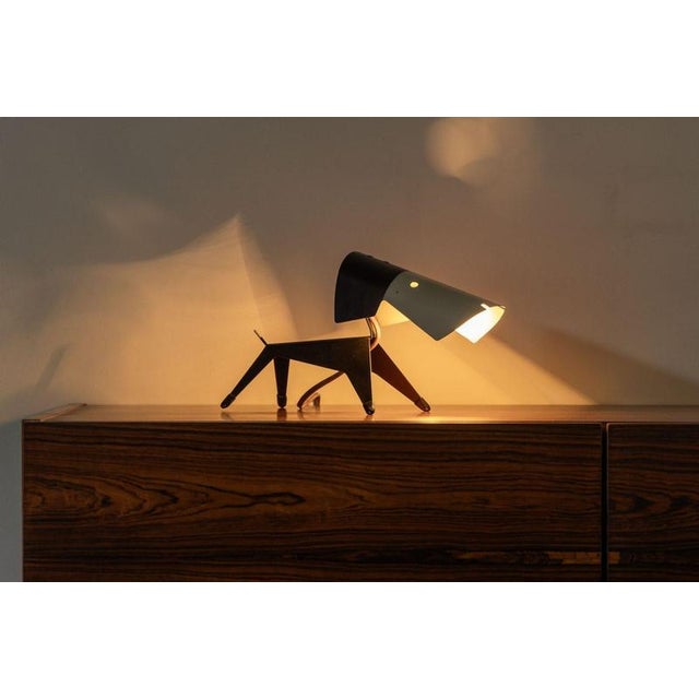 A rare and playful dog lamp designed by Jean-Boris Lacroix and manufactured by Disderot in France in 1950. This whimsical...