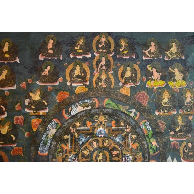 Decorative Thangka is an original colored artwork realized in Nepal in the XX century. Gouache on line. This beautiful...