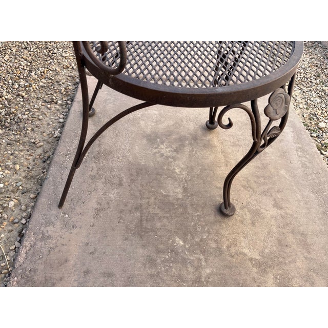 Single chair in need of a new foot. Otherwise, chair is in great condition, powder coated in a black/brown finish. Seat...