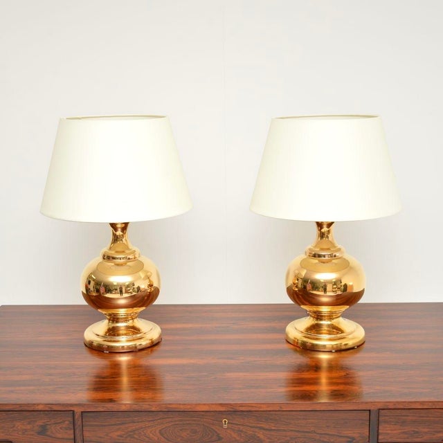A stylish, large and very impressive pair of vintage Italian ceramic table lamps, dating from around the 1960-70’s. They...