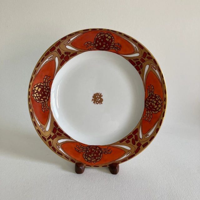 A set of 3, early 20th century, French Limoges porcelain plates with a hand painted exterior design in an aesthetic...