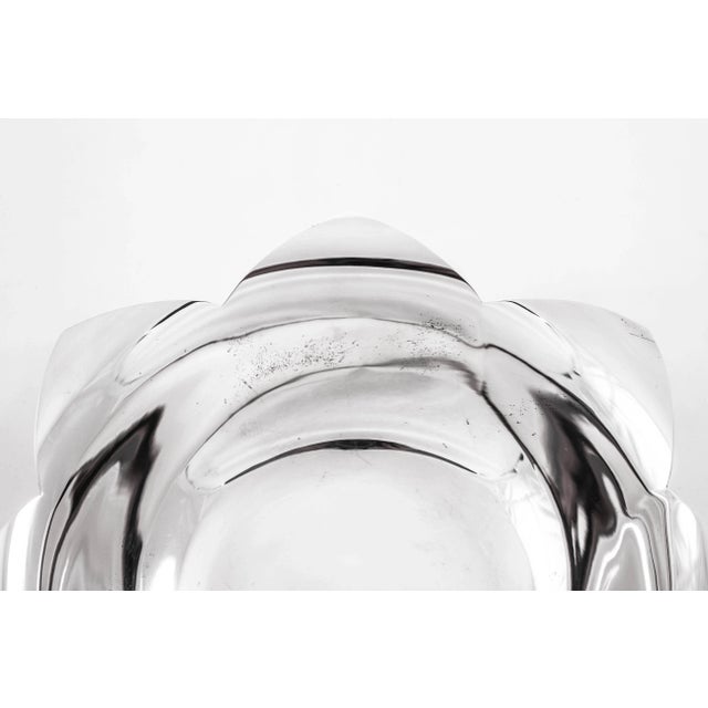 This sterling silver bowl reminds me of a blossoming flower. Tiffany and Company could take a simple design and transform...