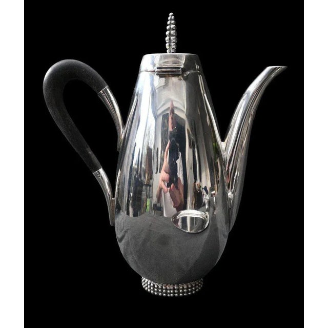 Jakob Grimminger worked as a goldsmith and craftsman in Schwäbisch Gmünd from 1893 to 1939. Silver and ebony tea and...