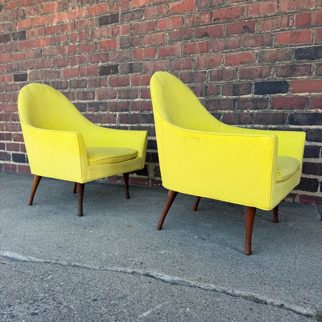 This is a pair of yellow lounge chairs made by Mid-Century Modern designer Paul McCobb for the Symmetric Group in 1962....