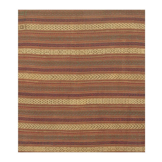 Mid-Century Anatolian Flat-Weave Turkish Kilim Rug, Circa 1950" Crafted in Turkey around 1950, this fine wool kilim...