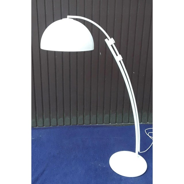 Vintage Adjustable White Metal and Plastic Arc Floor Lamp from Hustadt Leuchten, 1980s, in Good conditions. Designed 1980...
