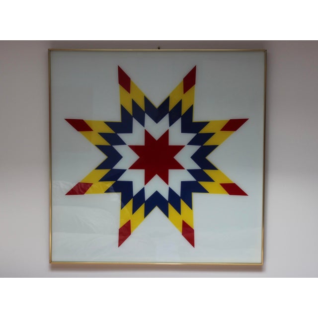 Fabulous large 1970's Op art on glass with brass frame. This piece is in good vintage condition with a minor imperfection...