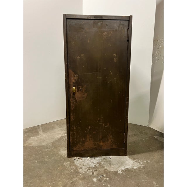 This antique safe from Art Metal Construction Company Inc is a must-have for collectors of mercantile and industrial...