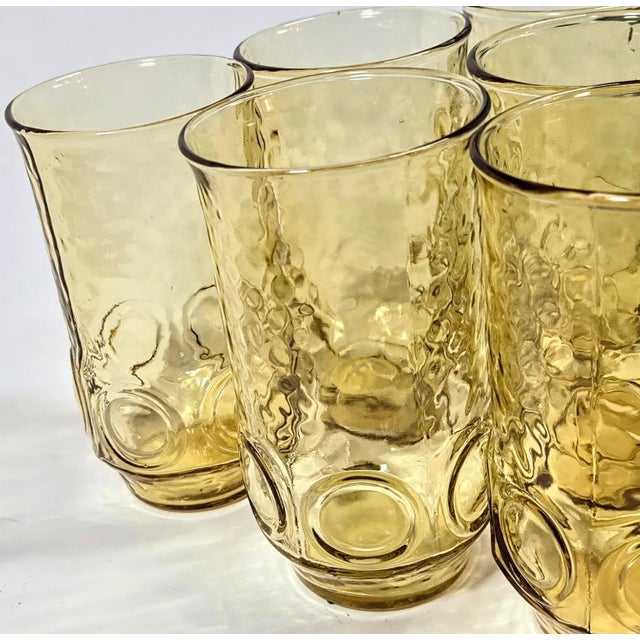 The golden yellow portals at the base of these tumblers remind me of a yellow submarine. The heavily textured design is a...