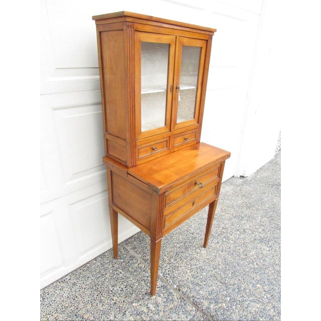 Antique French fruitwood secretary desk, c.1850 The wood is probably cherry, having that warm light color and patina. A...