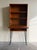 Exceptional Danish MCM teak secretary cabinet. This tall and elegant piece features beautifully figured teak, open...