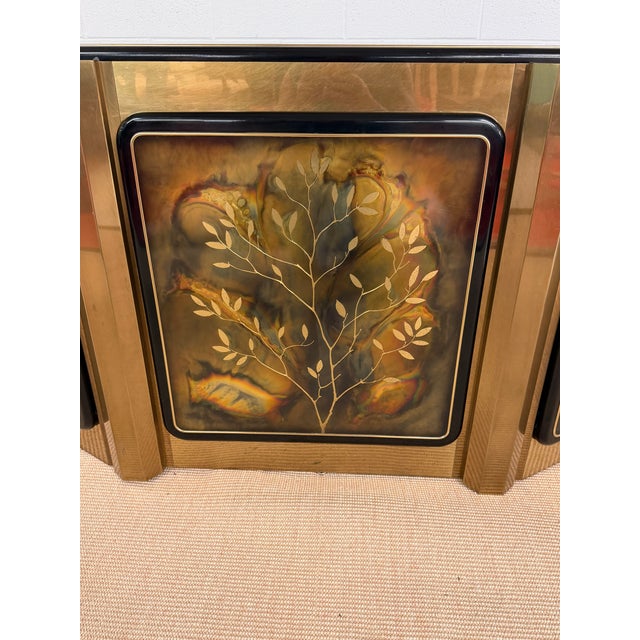 One of the trophy pieces of the Bernhard Rohne Collection for Mastercraft, the "tree of life" credenza. Circa 1970's, this...