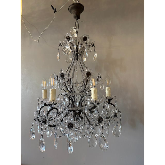 Elegant Italian chandelier from the 1950s, of Florentine origin, showcasing the refined craftsmanship for which Tuscany is...