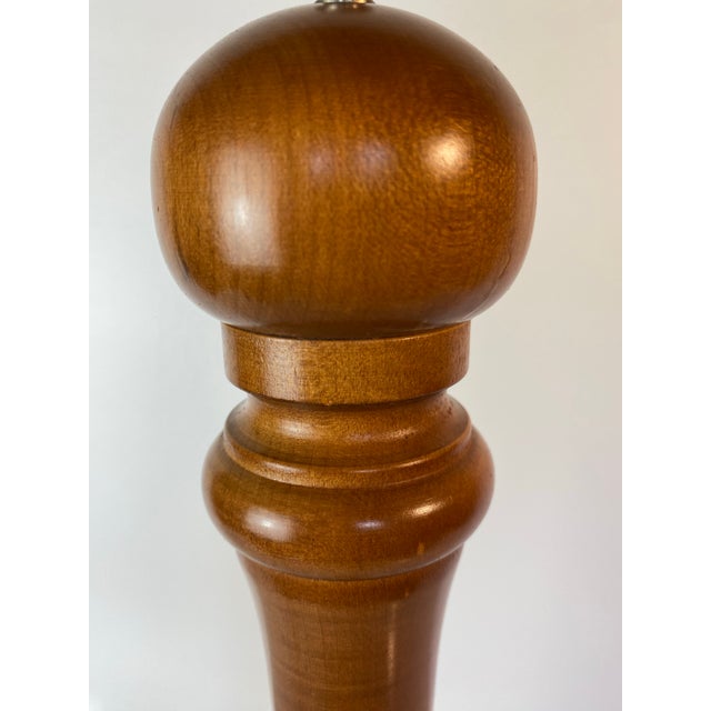 Impressive oversized hardwood pepper mill in a rich walnut-stained finish, crafted in the USA as part of a professional...