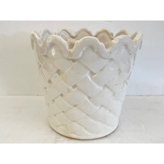 Beautiful ceramic round cachepot with faux woven basket motifs. Great addition to your boho chic inspired home.