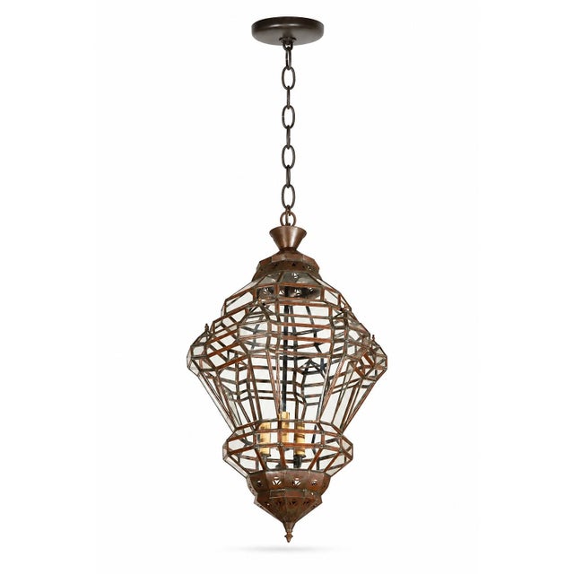 Elegant vintage Moroccan Moorish pendant lantern, handcrafted in Morocco circa 1980s. Its dramatic diamond-shaped...