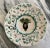 Here is a stunning hand painted and reticulated Italian decorative plate in plum/eggplant, cerulean, aqua and raspberry...