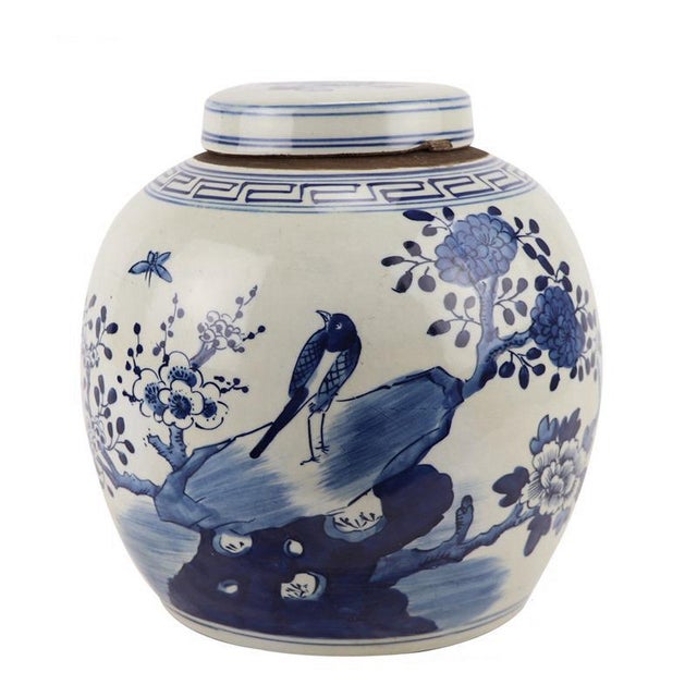 Pair of (" ginger jars with lid ,mix in different areas of house, bookcases,side table.Done in blue/wht porcelain.9 ' wide...