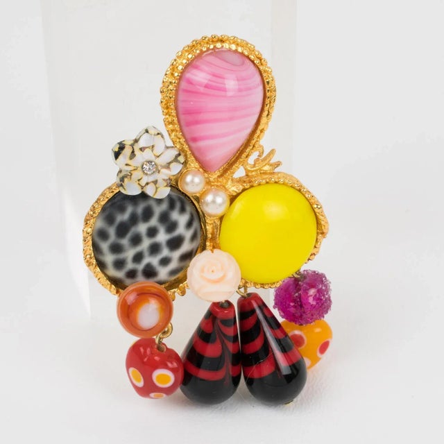 This is part of Chairish’s Costume Jewelry assortment. This mesmerizing Christian Lacroix Paris jeweled pin brooch...