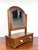 A mid to late 19th century table top tilting shaving / vanity mirror with dovetailed drawer in base. Features beautiful...