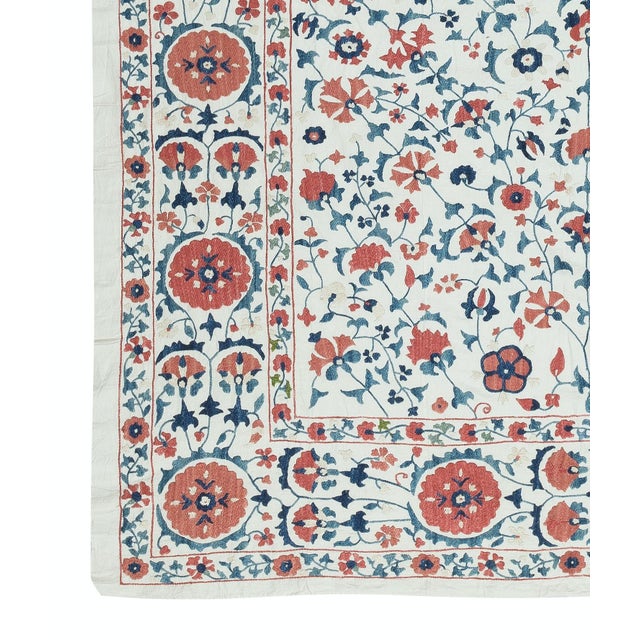 Introducing our exquisite new suzani hand embroidered wall hanging, a captivating piece that combines ancient...