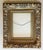 This ornate Rococo Baroque style wall frame features a deeply carved gold motif with elegant details throughout. This is a...