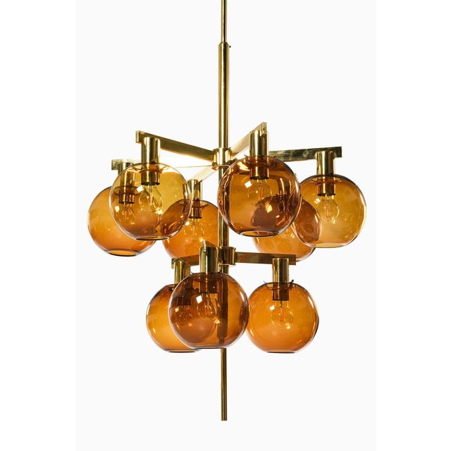 Ceiling lamp in brass and amber glass by hans-agne jakobsson, 1950's additional information: material: brass and amber...
