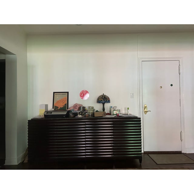 The Barbara Barry for Baker Modern Fluted Buffet Sideboard Cabinet, crafted exclusively for Baker Furniture in 2010, is a...