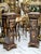 These elegant pedestals are made of hardwood and feature gold leaf details and a marble top. Their imposing design and...