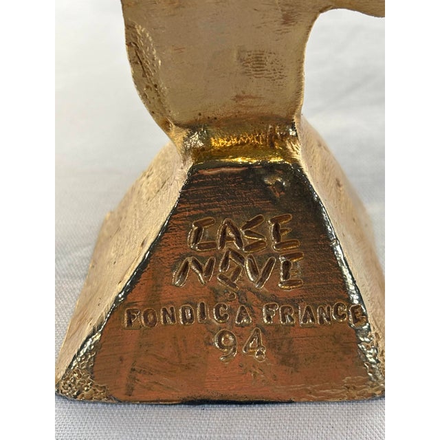 Gilt bronze candlestick signed Casenove, Fondica foundry mark, dated 94 (1994). In perfect condition. This piece has an...
