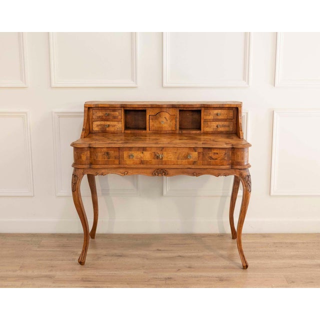 A finely crafted Louis XV–style tiered desk from eastern France, dating to the late 19th century. Executed in walnut and...