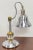 A stainless steel and brass table lamp. Recently restored and re-wired. American 1950's-1960's.