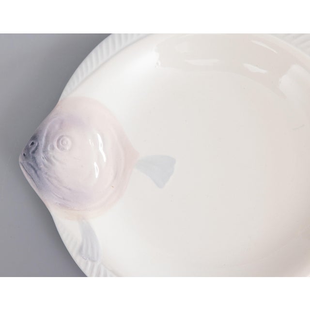 A stylish Art Deco French Longwy majolica fish plate, circa 1930. Maker's mark on reverse. It's a rare color, white with...
