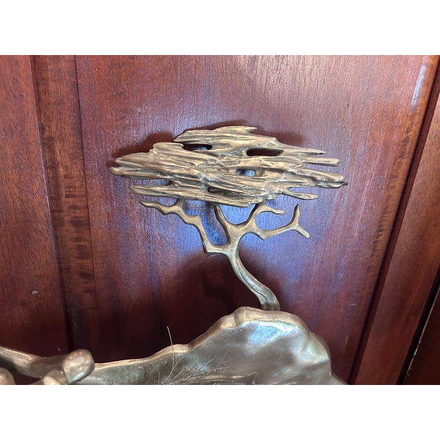 This is a Bijan of California brass Pebble Beach wall art. It’s in great condition.