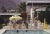 Poolside Host 1970 by Slim Aarons Slim Aarons Limited Estate Edition Guests by the pool at Nelda Linsk’s desert house in...