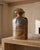 This large-scale terracotta studio pottery vase combines a strong architectural form with richly varied surface...