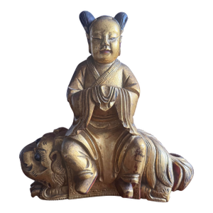 Chinese Carved Wooden Quan Yin or Ancestor Figure on Foo Dog Incense Holder. Beautiful Carving Sang De Bouef Undertones With Gold Overlay.