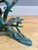 A verdigris finish bronze organic and naturalistic cocktail table by Willy Daro. The base of branches and leaves with two...
